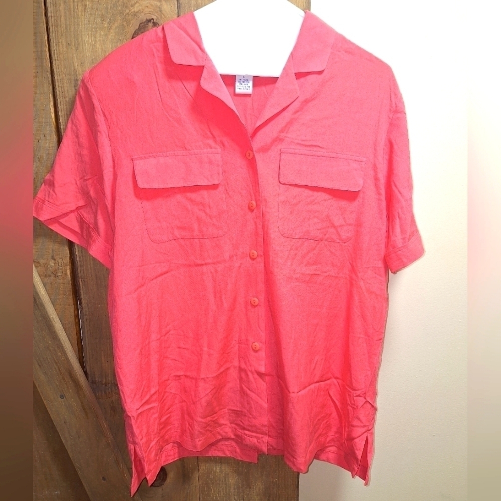 An Anna and Frank 100 % Silk short sleeve button-down shirt in a size large.